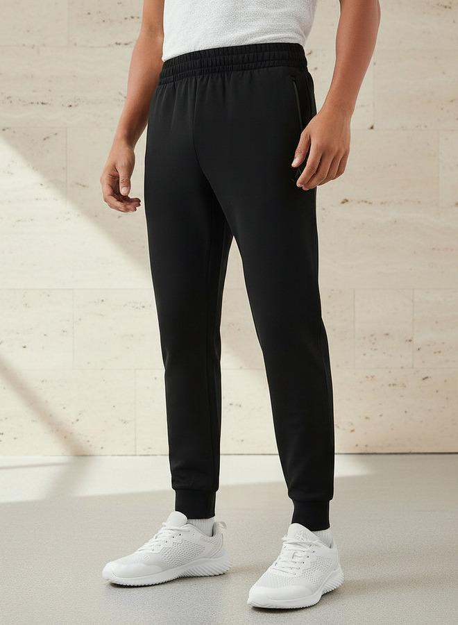 Active Men Regular Fit Joggers with Zipper Pockets - Image 1